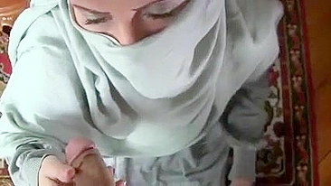 Hot babe got cum on hijab after perfect blowjob given to the guy with camera