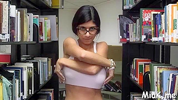 Busty Mia Khalifa undresses keeping silence in library