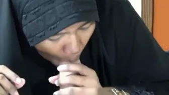 Muslim woman in dark hijab sucks white dick in amateur POV video Muslim woman in dark hijab sucks white dick in amateur POV video