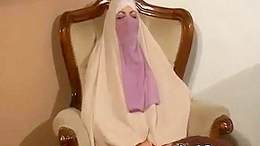 Muslim beauty in hijab elegantly sucks and fucks on camera