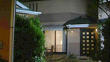 Japanese housewife sucks guest's penis on the porch while husband is inside