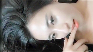 Stunning Chinese model elegantly moves on camera and masturbates