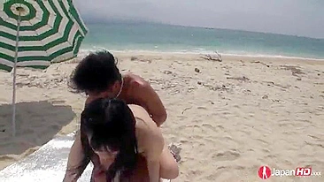 Japanese cutie named Hina Maeda squirts when guy fucks her on beach and gets pussy creampied