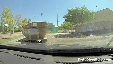 Latina slut Elyce Ferrera is surprised to see a cock sticking out of the hole in the public toilet cabin