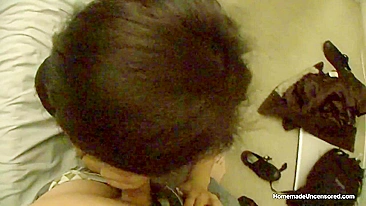 Guy with camera receives a pleasant blowjob, puts on condom, and fucks booty chick in her bedroom