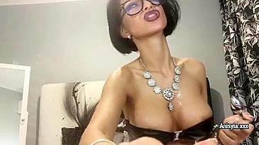 Snazzy webcam girl in short skirt, sexy stockings, with nice glasses and a tail butt plug makes hot solo show