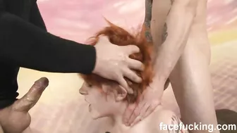Rude guys fuck face of amateur red-haired sexpot in a hardcore way and make here choking and gagging