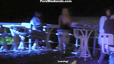 Drunk party girls play with blindfolded dude in bed