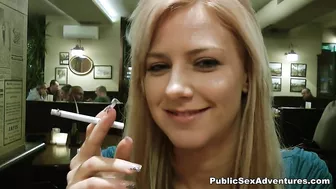 Blonde tourist in fishnets serves man's cock in restroom