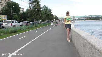 Jeny Smith walks around European city and flashes nice pussy