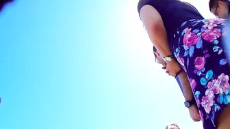 Friend films random girl's booties under skirts outdoors