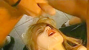 Great bukkake scene of girl getting tonnes of cum over face