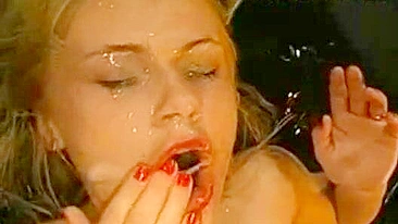 Great bukkake scene of girl getting tonnes of cum over face