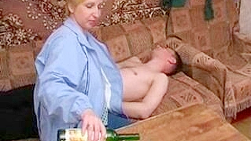 Devious blonde mom lures drunken son into incest sex on the sofa