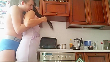 Russian boy gives dark-haired mom incest cunnilingus in the kitchen