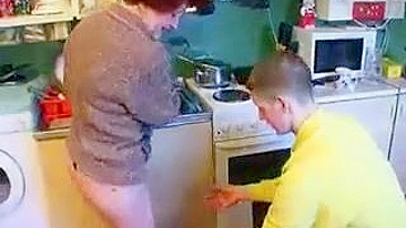 Russian MILF with red hair enjoys incest sex with son in the kitchen