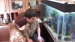 Man forgets about fishes when he fucks the plump mom in incest porn