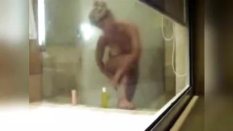 Son spying at mom in the shower as she shave her hairy cunt