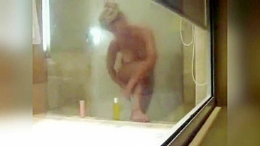 Son spying at mom in the shower as she shave her hairy cunt