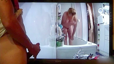 Son spying on chubby mom masturbates with shower head