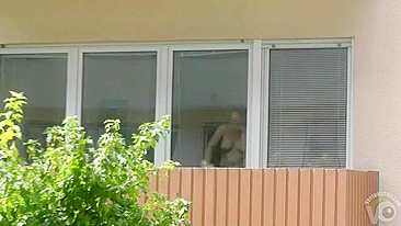 Spying on my hot neighbor she naked cleaning her house