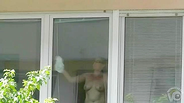 Spying on my hot neighbor she naked cleaning her house