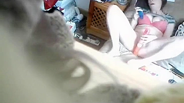 Nerdy mom was caught on spy cam masturbating in bedroom