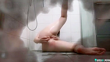 Hidden camera caught my sister's horny GF masturbating in our shower