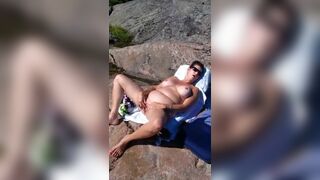 Short-haired momma wearing sunglasses masturbates passionately outdoors