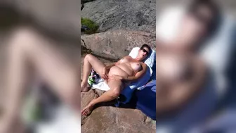 Short-haired momma wearing sunglasses masturbates passionately outdoors