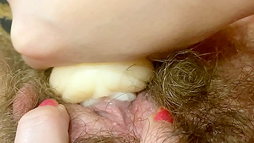 Coed takes roommate's artificial vagina to play with big clit