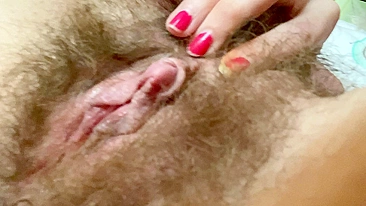 Horny chick enjoys hairy cunt masturbation with vibrator usage