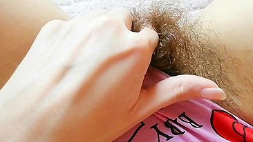 Amateur girl has a hairy cunt and wants everybody to check it out