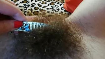 Narcissistic girl likes nothing more than playing with a hairy bush