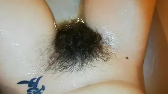 Narcissistic girl likes nothing more than playing with a hairy bush