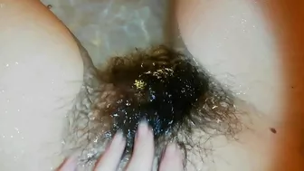 Narcissistic girl likes nothing more than playing with a hairy bush