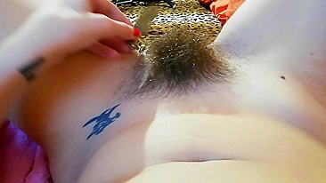 Narcissistic girl likes nothing more than playing with a hairy bush