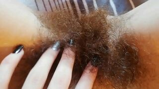 Mischievous camgirl tries to impress men with hairy bush and pissing