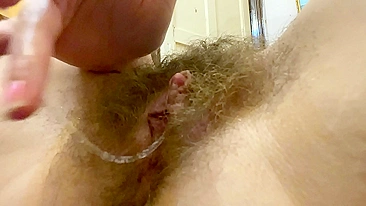 Mom with hairy bush masturbates and demonstrates results of orgasm