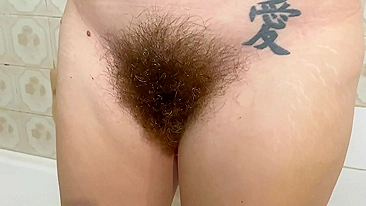 After shower naughty mom permits hubby to take care of her hairy bush
