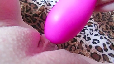 Close up video with amateur mom touching her big clit using a vibrator