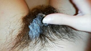 Amateur mom with super hairy bush relaxes naked in the bathroom