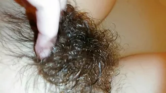 Amateur mom with super hairy bush relaxes naked in the bathroom