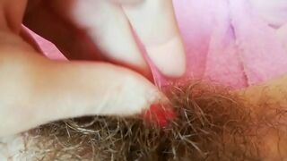 Hairy cunt drips with juices during amateur fingering for the camera