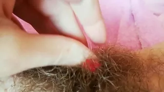 Hairy cunt drips with juices during amateur fingering for the camera