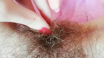 Hairy cunt drips with juices during amateur fingering for the camera