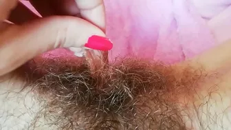 Hairy cunt drips with juices during amateur fingering for the camera