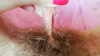 Hairy cunt drips with juices during amateur fingering for the camera