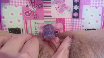 Girl rubs her big clit and uses dildo for hairy twat in amateur clip