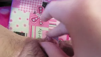 Girl rubs her big clit and uses dildo for hairy twat in amateur clip